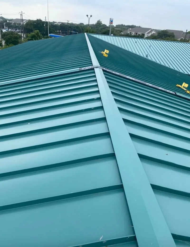 Green commercial metal roof ridge and valley for Metal Roof Repair in Mehlville