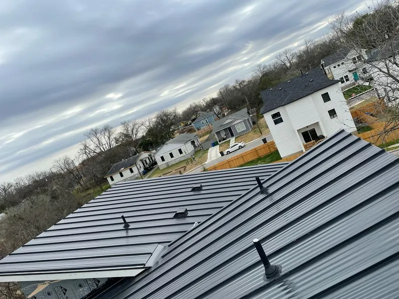 Standing seam metal roof panels with vents for Skylight Repair in Mehlville